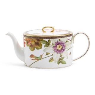 Close-up shot of Wedgwood Hummingbird 3-piece Teaware Set defined by expressive floral motifs and an artfully sculpted bird finial finished with 22-carat gold detailing | Kneen & Co