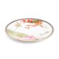 Close-up shot of Wedgwood Hummingbird Salad Plate defined by expressive floral motifs and an artfully sculpted bird finial finished with 22-carat gold detailing | Kneen & Co
