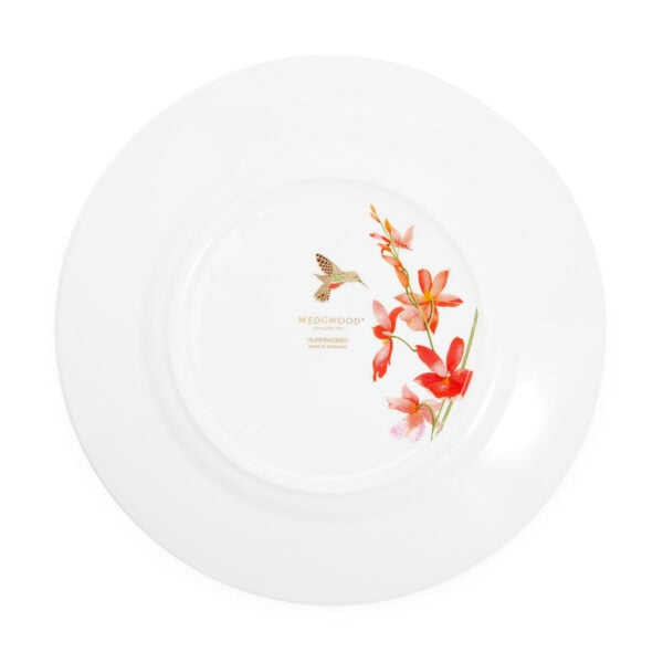 Close-up shot of Wedgwood Hummingbird Salad Plate defined by expressive floral motifs and an artfully sculpted bird finial finished with 22-carat gold detailing | Kneen & Co