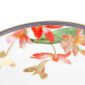 Close-up shot of Wedgwood Hummingbird Salad Plate defined by expressive floral motifs and an artfully sculpted bird finial finished with 22-carat gold detailing | Kneen & Co