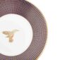 Close-up shot of Wedgwood Hummingbird Tea Cup and Saucer defined by expressive floral motifs and an artfully sculpted bird finial finished with 22-carat gold detailing | Kneen & Co
