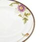 Close-up shot of Wedgwood Hummingbird Oval Platter defined by expressive floral motifs and an artfully sculpted bird finial finished with 22-carat gold detailing | Kneen & Co
