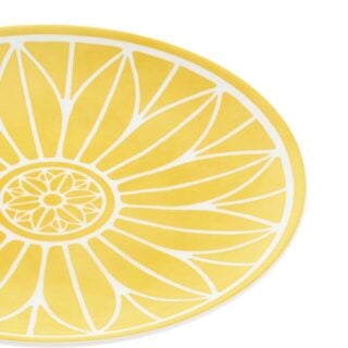Close-up shot of Christofle Malmaison Riviera Bread Plate in yellow Limoges porcelain with hand-drawn palmette detailing | Kneen & Co