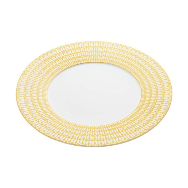 Close-up shot of Christofle Malmaison Riviera Charger Plate in yellow Limoges porcelain with hand-drawn palmette detailing | Kneen & Co