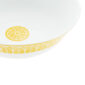 Close-up shot of Christofle Malmaison Riviera Salad Serving Bowl in yellow Limoges porcelain with hand-drawn palmette detailing | Kneen & Co