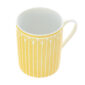 Close-up shot of Christofle Malmaison Riviera Mug in yellow Limoges porcelain with hand-drawn palmette detailing | Kneen & Co