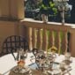 Sun-drenched setting featuring a Christofle Malmaison Silver-Plated Tea and Coffee Service | Kneen & Co