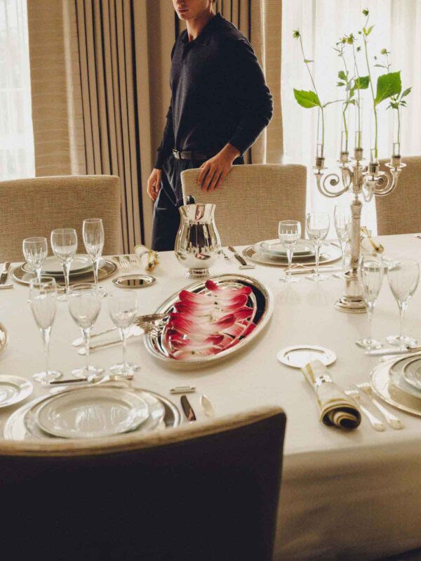 CHRISTOFLE-NewMalmaison-Mood-2026-RGB-HD-38-1200w-100KB Elegant formal dining room setting featuring a Christofle Malmaison dinnerware | Kneen & Co