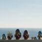 Scenic outdoor setting of the Christofle Mood Flatware Set in an egg-shaped storage | Kneen & Co