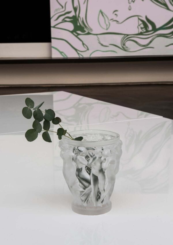 LALIQUE-10547100-Bacchantes-Vase-SS-Lifestyle-image-1200w-100KB Lalique Bacchantes Small Vase set on table | Kneen & Co
