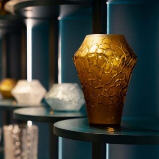 Lalique Caldera Vase Canyon set on table | Kneen & Co