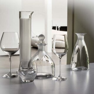 Lalique 100 POINTS Glassware set on table | Kneen & Co