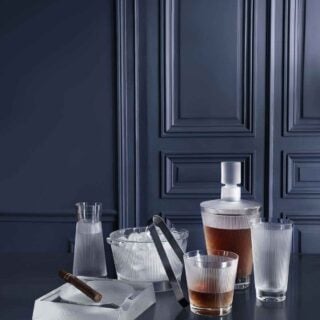 LALIQUE-Stemware-Decanter-Wingen-Barware-HR-Gilles-Pernet-Lifestyle-Image-1200w-100KB Lalique assorted Barware set on table | Kneen & Co
