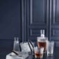 Lalique assorted Barware set on table | Kneen & Co