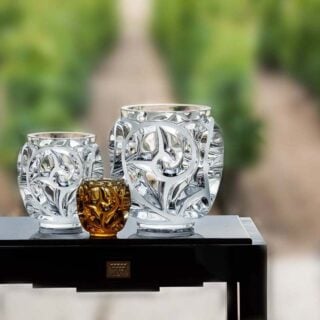 Lalique Tourbillons Vases set on garden table | Kneen & Co