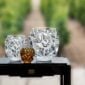 Lalique Tourbillons Vases set on garden table | Kneen & Co