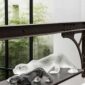Lalique Zeila Panther Large Sculpture Clear & Lalique Zeila Panther Small Sculpture Gray set on table | Kneen & Co