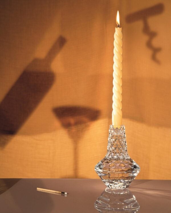 Saint-Louis Crystal Folia Large Candlestick with lit tapered candle on tabletop | Kneen & Co