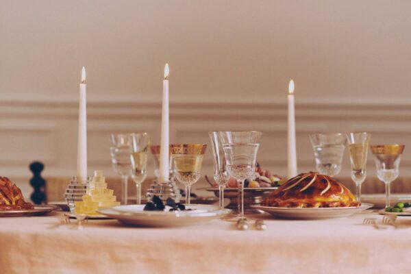 Saint Louis Crystal Apollo Gold Rim and Thistle Glassware on a festive table | Kneen & Co