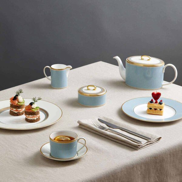 Wedgwood-Helia-701587471602-Afternoon-Tea-1200w-100KB Elegant afternoon tea service on a linen tablecloth with Wedgwood Helia Tea Set in fine bone china with gold banding and light blue pinstripe pattern | Kneen & Co