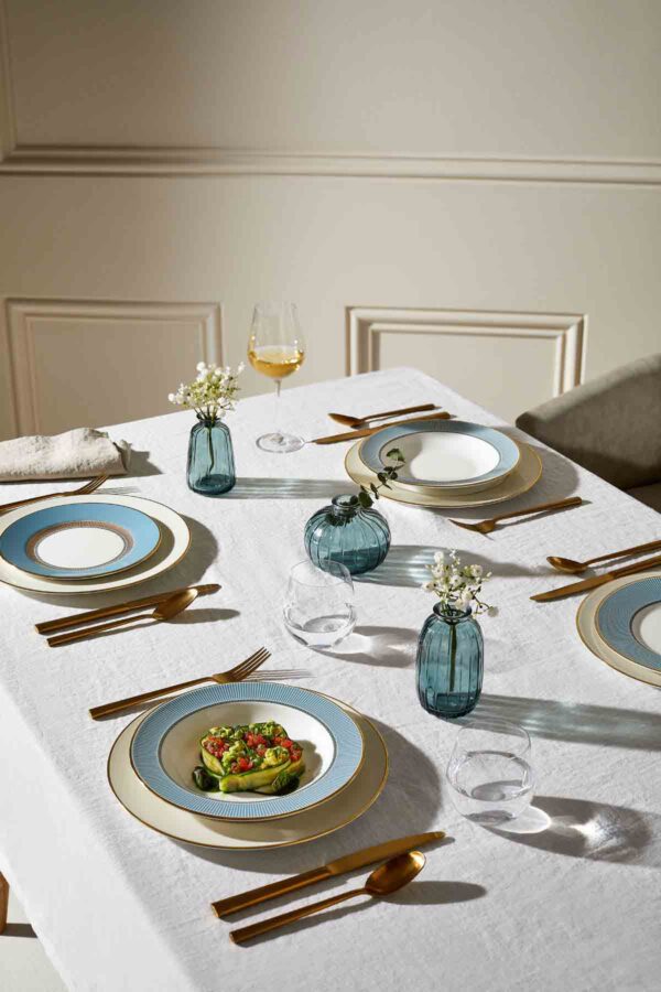 Modern dinner setting with Wedgwood Helia Dinnerware in fine bone china with 22-carat gold trim and blue pinstripe borders | Kneen & Co