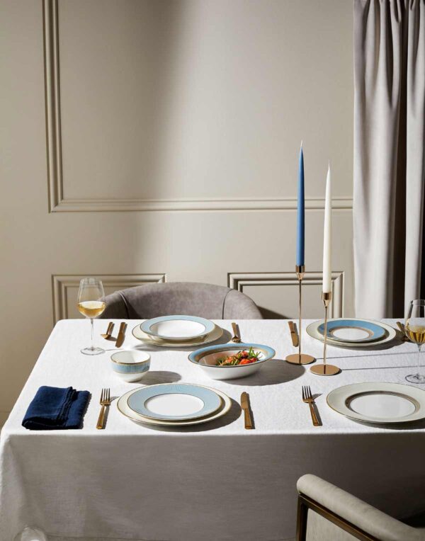 Wedgwood-Helia-Lifestyle-2-2023-1200w-100KB Modern dinner setting with Wedgwood Helia Dinnerware in fine bone china with 22-carat gold trim and blue pinstripe borders | Kneen & Co
