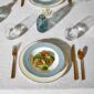 Modern dinner setting with Wedgwood Helia Dinnerware in fine bone china with 22-carat gold trim and blue pinstripe borders | Kneen & Co