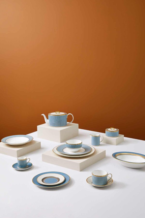 Modern dinner setting with Wedgwood Helia Dinnerware in fine bone china with 22-carat gold trim and blue pinstripe borders | Kneen & Co