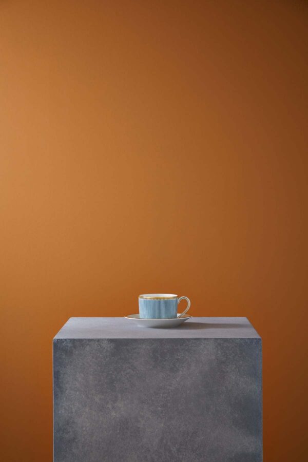 Wedgwood-Helia-Styled-Teacup-and-Saucer-2023-1200w-100KB Minimalist gallery display on a stone plinth with Wedgwood Helia Teacup and Saucer in fine bone china with gold banding | Kneen & Co