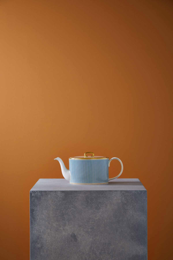 Wedgwood-Helia-Styled-Teapot-2023-1200w-100KB Minimalist gallery display on a stone plinth with Wedgwood Helia Teapot in fine bone china with gold banding | Kneen & Co