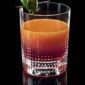 Baccarat Nancy crystal tumbler filled with a layered cocktail and garnished with a fresh hibiscus bud, showcasing the collection's signature diamond-cut crystal pattern | Kneen & Co