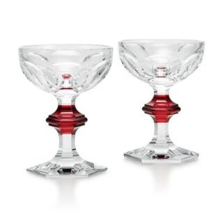 Baccarat Harcourt 1841 Coupes, Set of 2 in clear French crystal with a passion red stem accent, hexagonal foot, and six flat-cut facets | Kneen & Co