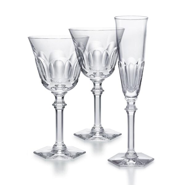 Baccarat Harcourt Eve crystal glassware collection featuring champagne flutes, wine glasses, and water glasses with the collection's signature hexagonal foot | Kneen & Co