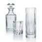 Baccarat Harmonie crystal barware collection featuring tumblers, highballs, whiskey glasses, decanters, and pitchers with signature vertical fluting | Kneen & Co