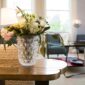 Bright living room setting with a Lalique Mossi Vase in clear crystal | Kneen & Co
