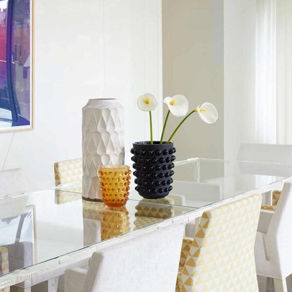 LALIQUE-10258400-mossi-xxl-vase3-1200w-100KB Modern dining room featuring the Lalique Mossi XXL Vase in black crystal and Lalique Mossi Vase Amber | Kneen & Co
