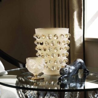 Elegant interior setting featuring the Lalique Mossi XXL Vase and Lalique Zeila Panther Large Sculpture Black | Kneen & Co