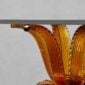 Close-up studio shot featuring the Lalique Cactus Table with an amber crystal base and a clear glass top | Kneen & Co