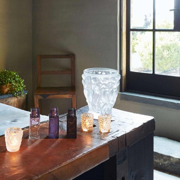 Rustic interior setting featuring the Lalique Bacchantes Grand Vase in clear and frosted crystal | Kneen & Co