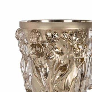 LALIQUE-Nmbr10719200-Bacchantes-Grand-Vase-1200w-100KB Close-up studio shot featuring the Lalique Bacchantes Grand Vase in gold-lustre crystal | Kneen & Co