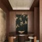 Luxurious dining room featuring the Lalique 2 Swallows Ceiling Lamp Clear Crystal & Gilded Finish in a satin gold finish | Kneen & Co
