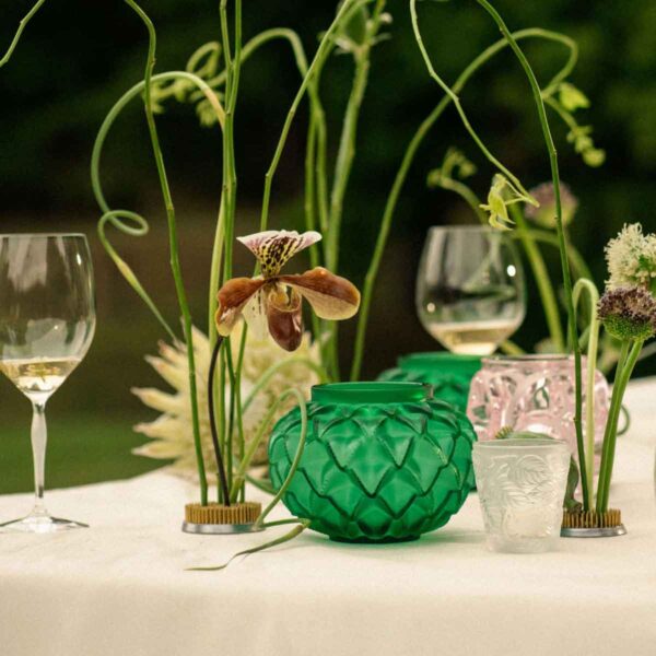 LALIQUE-objets-de-decoration-vase-languedoc-cristal-vert-Nmbr10091200-1200w-100KB Al fresco dining table set with white wine glasses and dynamic floral stems featuring the Lalique Languedoc Small Vase in green satin-finished crystal | Kneen & Co
