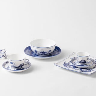 GINORI-OrienteItal-20260625-SEMISET-INDACO-0238-1200w-100KB Ginori 1735 Oriente Italiano Indaco assorted dinnerware set on table | Kneen & Co