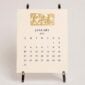 Shop the Printery 2027 Calendar Refill - Ecru, with black text and twelve motifs engraved in gold at Kneen & Co.