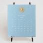 The Printery 2027 Calendar - Fog, white text with starburst engraved in gold | Kneen & Co