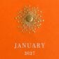 The Printery 2027 Calendar - Orange, white text with starburst engraved in gold | Kneen & Co