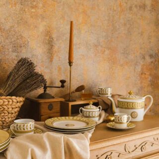 Bernardaud Constance Jaune Dinnerware set on table | Kneen & Co