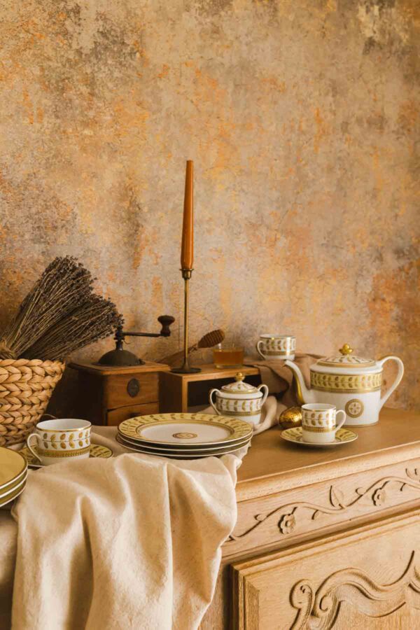 BERNARDAUD-ConstanceJaune-1-Lily-Rose-1200w-100KB Bernardaud Constance Jaune Dinnerware set on table | Kneen & Co