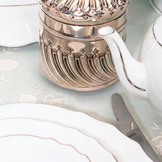Herend Golden Edge Tea Service close up on table | Kneen & Co
