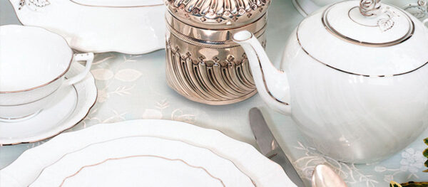 Herend Golden Edge Tea Service close up on table | Kneen & Co